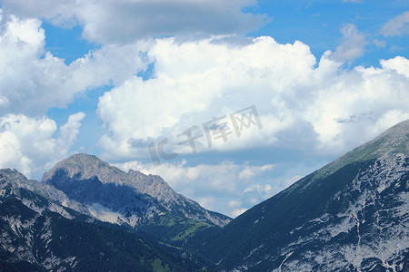 印象唐山摄影照片_奥地利阿尔卑斯山的山脉和天空
