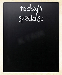 今日拼团摄影照片_黑板上用白色粉笔手写的“今日特价”