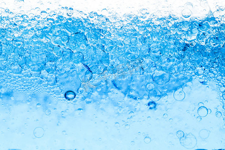蓝色科技感标题框摄影照片_水下蓝色气泡的背景