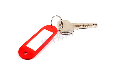 钥匙和红色饰品，空的，用于隔离的设计空间
