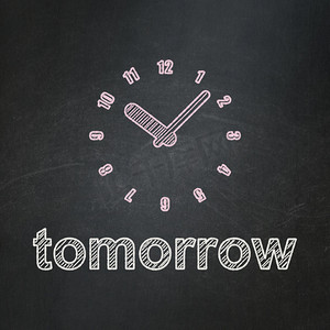 时间概念：黑板背景上的时钟和明天