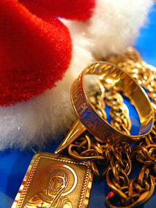 新年礼物，金色，深蓝色背景，链条，戒指，圣诞节