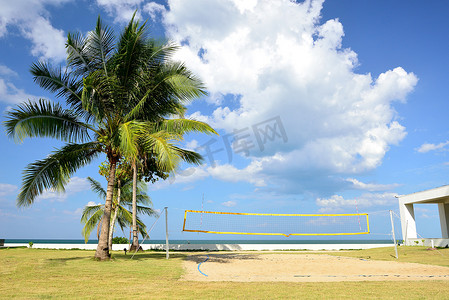 阳光沙滩摄影照片_沙滩排球场。
