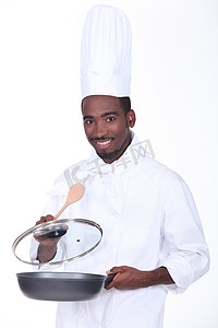拿着平底锅的黑人厨师