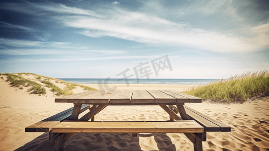 放在沙滩上的一张木制野餐桌