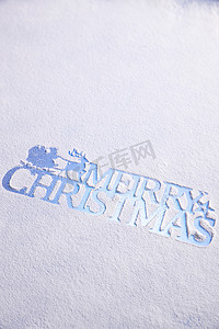 圣诞节白色英文摄影照片_雪地上的圣诞节英文
