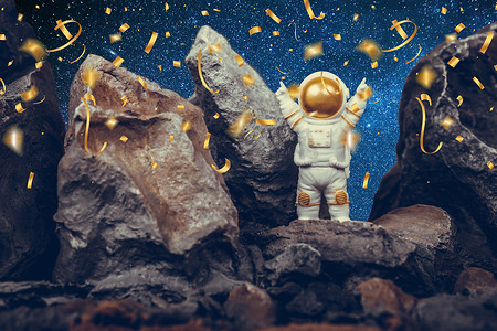 Astronaut standing on rocky mountain celebrating with raising arms while falling shiny golden confetti. Spaceman wearing white space suit and helmet. Concept of cosmonautics, space travel, freedom and winning.