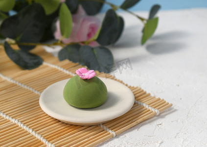 Japanese confectionery wagashi on table. Traditional rice dessert. Vegan sweets. Copyspace.