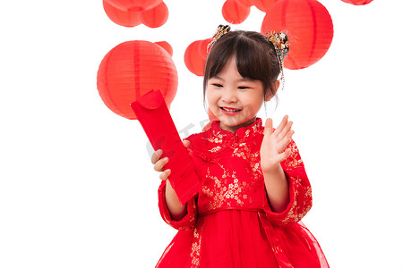 中国新年红包摄影照片_快乐的小女孩拿着红包