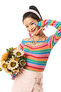 时尚个性的年轻女孩拿着向日葵