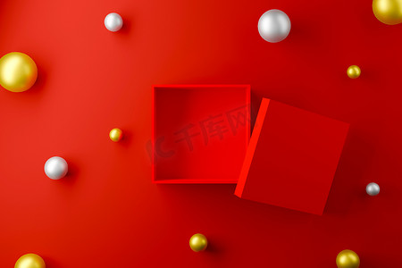 红色的盒子在红色的背景上打开,球体呈金银色.3d说明