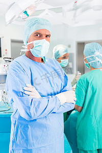 hospital摄影照片_Hospital surgeons operating in operation room