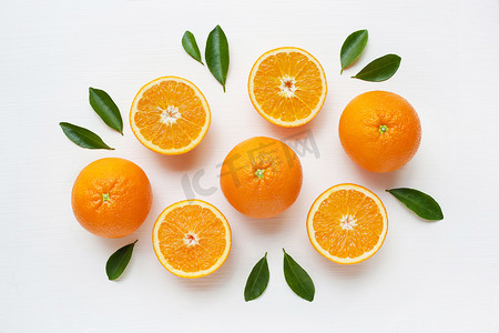 背景橙摄影照片_在白色背景下分离的新鲜橙柑桔果.