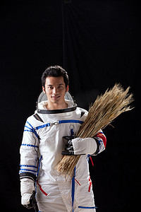 飞行员摄影照片_宇航员抱着麦子