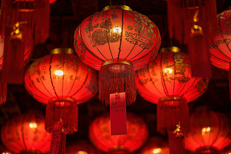 Bangkok, Thailand - December, 20, 2021 : Red Lanterns with chinese text mean 