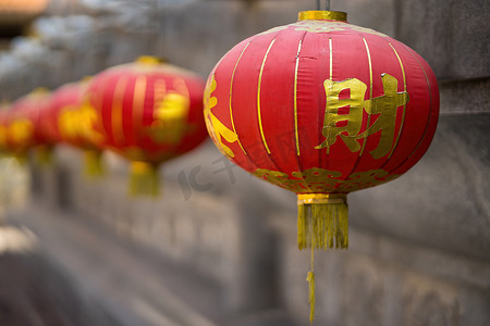 Bangkok, Thailand - December, 20, 2021 : Red Lanterns with chinese text mean 