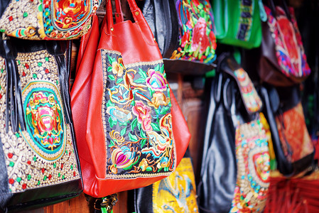 embroidery摄影照片_Handmade bags decorated with traditional Chinese embroidery