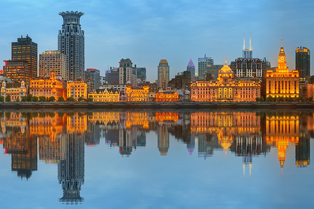 Skyline of The Bund, marvellous historical buildings and Huangpu River on sunset, Shanghai, China