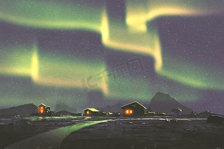 北极光下的小村的夜晚风景 