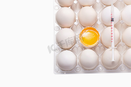 蛋黄摄影照片_鸡蛋注射器