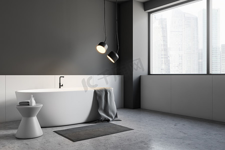 浴室地板摄影照片_简约的浴室角落, 灰色和白色的墙壁, 水泥地板, 大窗户, 白色浴缸与灰色毛巾和灰色的椅子。3d 渲染