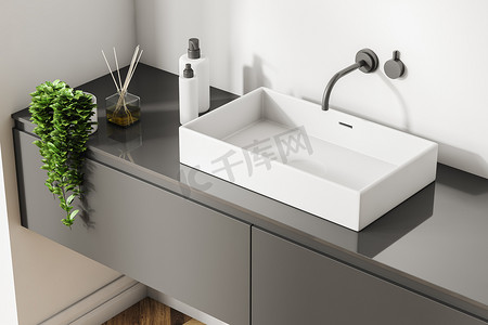 白色长方形浴室水槽的顶部视图, 位于白色墙壁和木地板的灰色台面上。3d 渲染