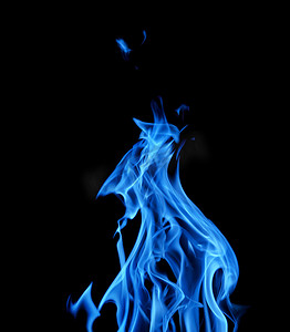 暗黑色背景摄影照片_在黑色的暗蓝色火焰