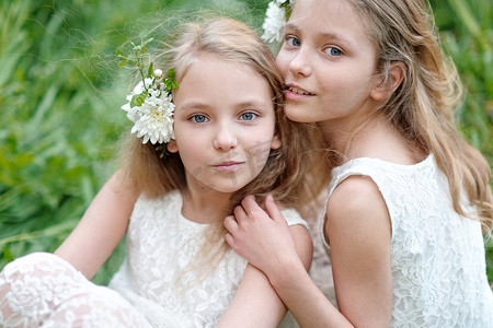 Portrait of two little girls twins