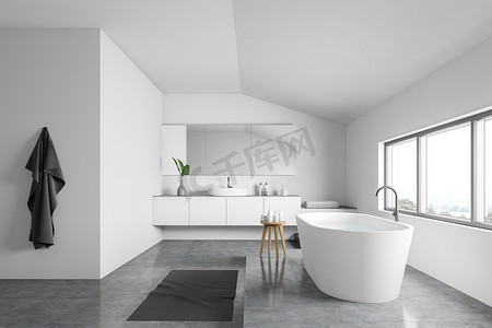 圆形水池摄影照片_带浴缸和水槽的白色浴室的侧面视图