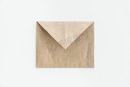 牛皮纸信封摄影照片_顶视图的牛皮纸信封
