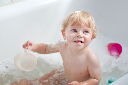 Little baby boy having bath