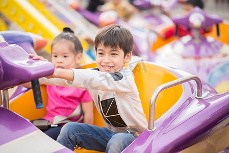 Kids playing in amusement fun park