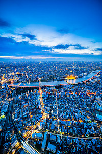 亚洲商业概念房地产和企业建设-全景城市城市天际线鸟瞰下, 日本东京黄昏的天空和霓虹灯的夜晚