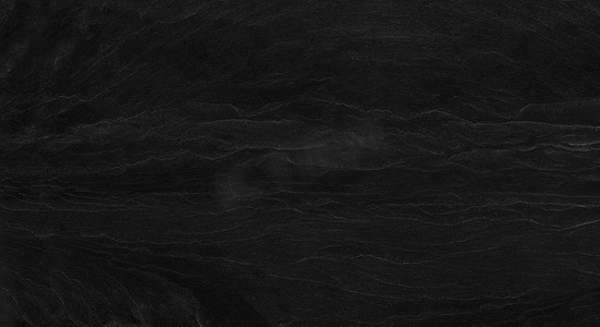淘宝横幅粉晶手镯摄影照片_深灰色的石头背景与复制空间。带有岩石纹理的黑色磨擦横幅。石墙的纹理.