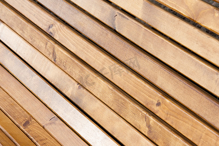 纹理背景。木制品、 木制板条。一棵树的篱笆。木制面板