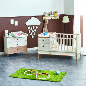 婴儿房设计家具风格与床柜和梳妆台，装饰儿童房与灯架和沙发风格.