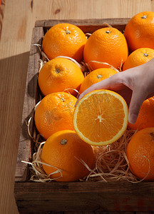 橘子摄影照片_新鲜成熟的桔子
