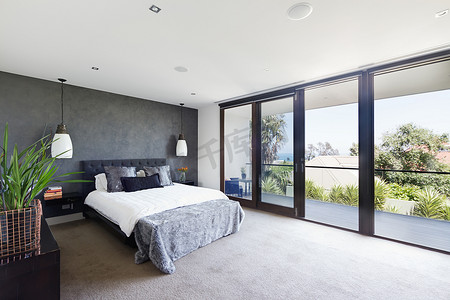 豪宅摄影照片_宽敞的内部空间的设计器的主卧室在豪华澳大利亚