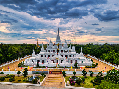 Samut Prakan, Thailand / September 27, 2020：Wat Asokaram, Aerial View of White Buddhist Pagoda with Beautiful Twilight