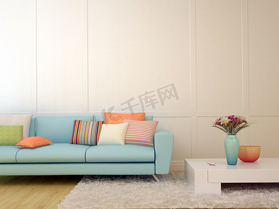 枕头摄影照片_蓝色沙发与多彩枕头和一个白色的咖啡桌