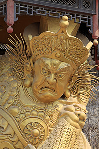 菩萨摄影照片_在一座寺庙中的佛教菩萨雕像