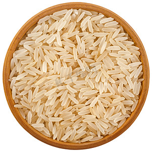 在白色背景上孤立的碗顶视图表面金黄稻堆