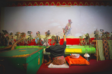 wayang kulit or shadow puppets from Java, Indonesia puppet show by dalang or puppeteer . Wayang made from leather