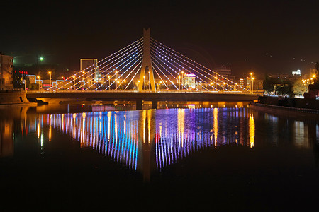 张家口市摄影照片_在夜晚的河桥建筑景观