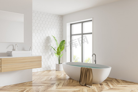 现代浴室角落，配有白色蜂窝砖墙、木制地板、舒适的浴缸和带有水平镜的水池。有模糊的热带景色的窗户.3d渲染