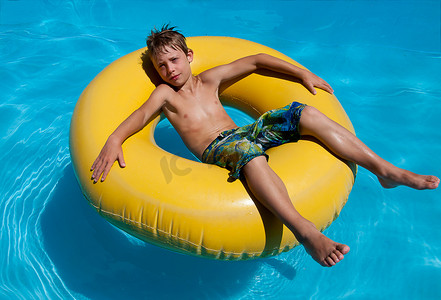 Boy in the water on an inflatable ring