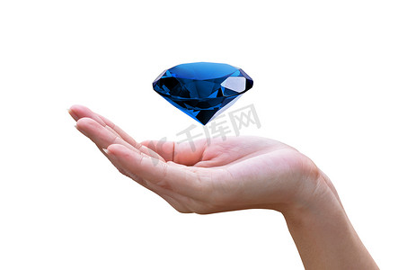 isolated摄影照片_在手中的蓝色钻石modrý diamant v rukou