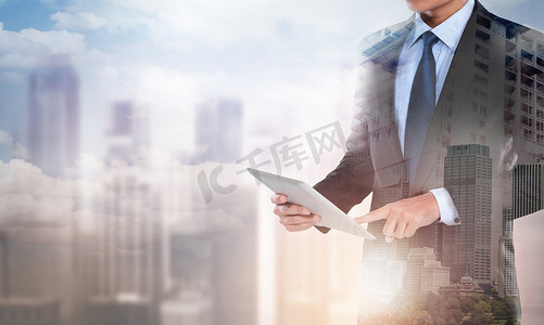 double exposure businessman working with new modern computer tab