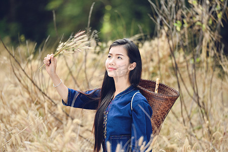 Asia woman farmer in grass field nature / Portrait of beautiful 