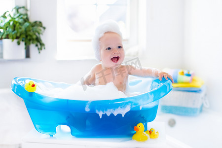 Little baby taking a bath